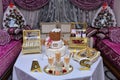 Moroccan wedding buffet. Cake and flowers. Traditional Moroccan salon