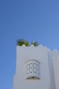 Moroccan white design window upstairs