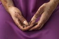 Moroccan woman with henna painted hands