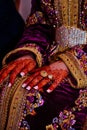 Moroccan woman with traditional henna painted hands. Royalty Free Stock Photo