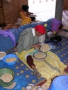 Moroccan woman working at argan nuts