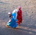 moroccan women with child in Djemaa El Fna square, Marrakech