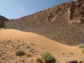 Ancient ruined wall in the desert Royalty Free Stock Photo