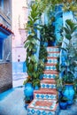 Morocco is the blue city of Chefchaouen, endless streets painted in blue color. Lots of flowers and Souvenirs in the beautiful Royalty Free Stock Photo