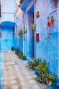 Morocco is the blue city of Chefchaouen, endless streets painted in blue color. Lots of flowers and Souvenirs in the beautiful Royalty Free Stock Photo