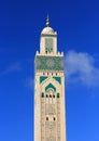 Morocco, Casablanca. Hassan II Mosque against a blue sky.