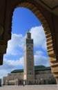 Morocco, Casablanca. Hassan II Mosque minaret framed by an arch.