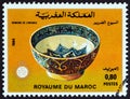 MOROCCO - CIRCA 1984: A stamp printed in Morocco from the `Week of the Blind` issue shows painted bowl, circa 1984.