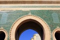 Morocco, Fez. Detail of an arched gateway with symmetrical Islamic - Arabesque style glazed wall tiles. .