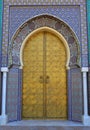 Morocco, Fez, Islamic inscribed brass arched door and glazed tile surround