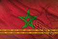 Morocco flag and orange Covid-19 stamp with border tape. Coronavirus or 2019-nCov virus concept