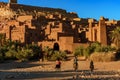 Morocco. Horses riders in front of the Ksar Ait Ben haddou