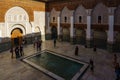 Morocco. Marrakesh. Tourists at Madrasa Ben Youssef. The largest and most important madrassah in Morocco