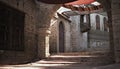 Morocco themed background of an empty stoned interior courtyard ally with shade cloth tapestries .