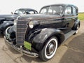 old black 1938 Chevrolet Chevy Master sedan by GM. CADEAA 2022 classic car show.