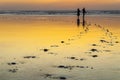 A Moroccan couple at the beach at sunset Royalty Free Stock Photo