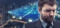 Morose businessman against city Royalty Free Stock Photo
