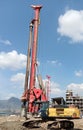 rotary pile drilling equipment operator is drilling at the project site