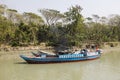 Morrelganj, Bangladesh, February 27 2017: Two ships are loaded with sand at the riverbank via pipeline