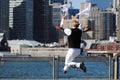Morris Dancer Leaping by the East River Royalty Free Stock Photo