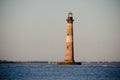 Morris Island Lighthouse at sunset in Folly Beach South Carolina Royalty Free Stock Photo