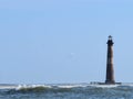 Morris Island Lighthouse with waves Folly Beach SC Royalty Free Stock Photo