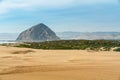 An Amazing Morro Rock and Sand Dunes at Morro Bay, California Coastline Royalty Free Stock Photo
