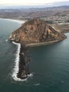 Morro Bay aerial photo at sunset with tall ships entering harbor Royalty Free Stock Photo