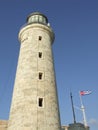 The Morro Castle lighthouse and cuban flag