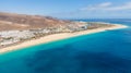 Morro Jable Canary Island, Fuerteventura Spain, Aerial view on coast of atlantic ocean and beach, Drone shot of sea Royalty Free Stock Photo