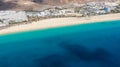 Morro Jable Canary Island, Fuerteventura Spain, Aerial view on coast of atlantic ocean and beach, Drone shot of sea Royalty Free Stock Photo