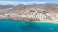 Morro Jable Canary Island, Fuerteventura Spain, Aerial view on coast of atlantic ocean and beach, Drone shot of sea Royalty Free Stock Photo