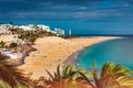 Morro Jable, Fuerteventura, Spain. Breathtaking beach Playa del Matorral in the rays of the sunset. Morro Jable and Playa del Royalty Free Stock Photo