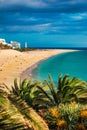 Morro Jable, Fuerteventura, Spain. Breathtaking beach Playa del Matorral in the rays of the sunset. Morro Jable and Playa del Royalty Free Stock Photo