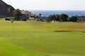 Morro Jable golf course in the south of Fuerteventura with the sea in the background Royalty Free Stock Photo