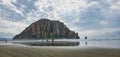 Morning at the Morro rock mountain peak and it's reflection view on Morro Bay Beach in California Royalty Free Stock Photo