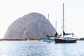 Morro Rock and yachts in the bay at anchor. Morro Bay harbor, California Royalty Free Stock Photo