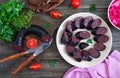 Morsilla - blood sausage. Pieces of Spanish black pudding on a plate. Easter menu Royalty Free Stock Photo