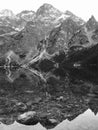 A stunning reflection of the stones of Morskie Oko - Poland - Tatra National Park in the Rybi Potok Valley Royalty Free Stock Photo
