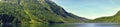 Morskie Oko mountain lake, surrounding forest, Miedziane and Opalony Wierch peaks with Schronisko przy Morskim Oku shelter house