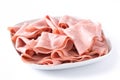 Mortadella slices on white plate isolated Royalty Free Stock Photo