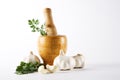 Mortar and pestle with garlic and parsley