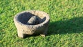 Mortar and Pestle Grinding Machine Made of Stone Royalty Free Stock Photo