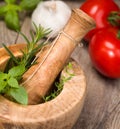 Mortar and Pestle with Herbs Royalty Free Stock Photo