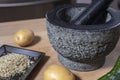 Mortar and pestle made of stone Royalty Free Stock Photo