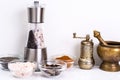 Mortar with pestle and mill for spices Royalty Free Stock Photo