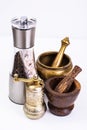 Mortar with pestle and mill for spices Royalty Free Stock Photo