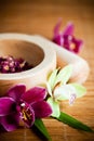 Mortar and pestle with orchids