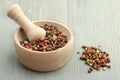 Mortar and pestle with pepper mix Royalty Free Stock Photo