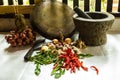 Mortar and pestle with pepper and spices